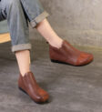 Ví da top-grain leather màu nâu với đường chỉ may tỉ mỉ